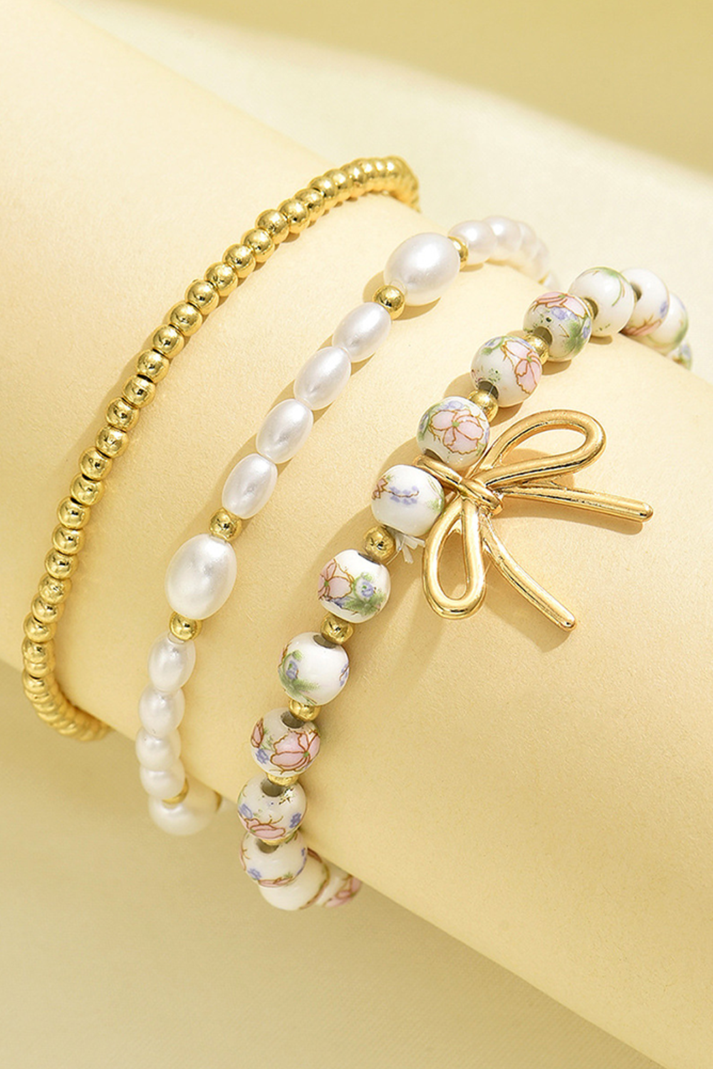 Aapparella - Bow Knot Beaded Triple Layer Bracelet Set