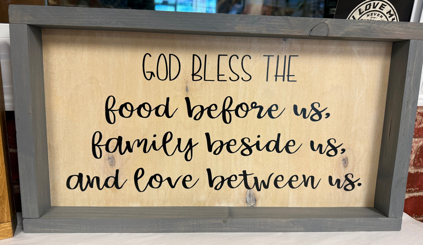 Wooden wall art “God bless the food before us, family beside us, and love between us.”