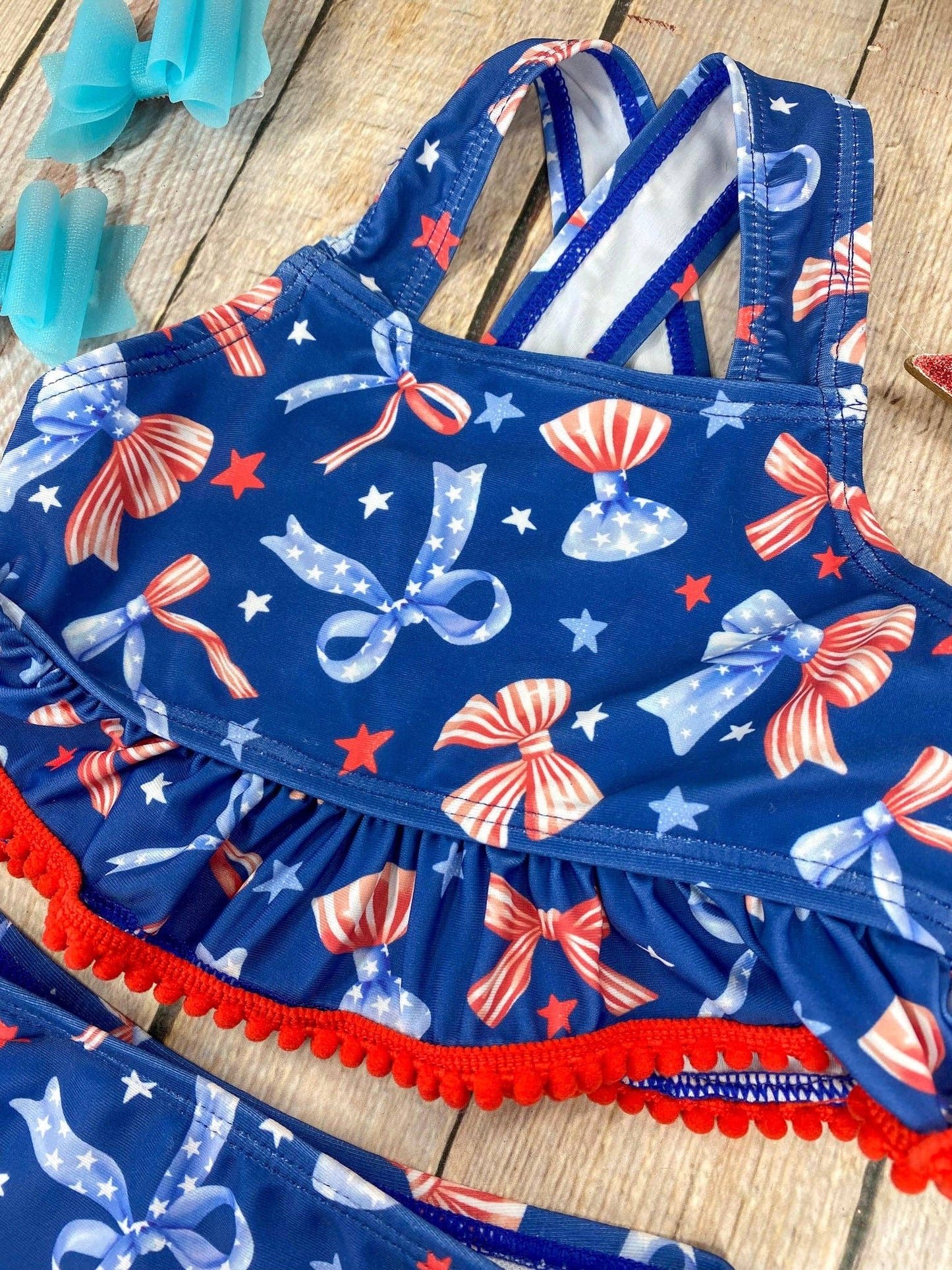 The Hair Bow Company - Navy Patriotic Bow Print Two-Piece Swimsuit | Baby Girls Ruffle Swim Set