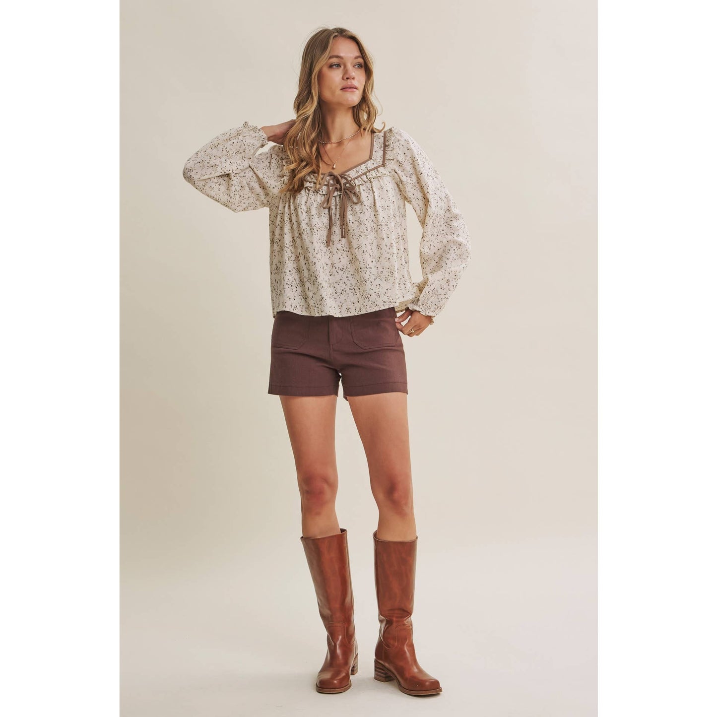 in february - PRAIRIE ROMANCE BOTANICAL BOW TIE FRONT RUFFLED BLOUSE