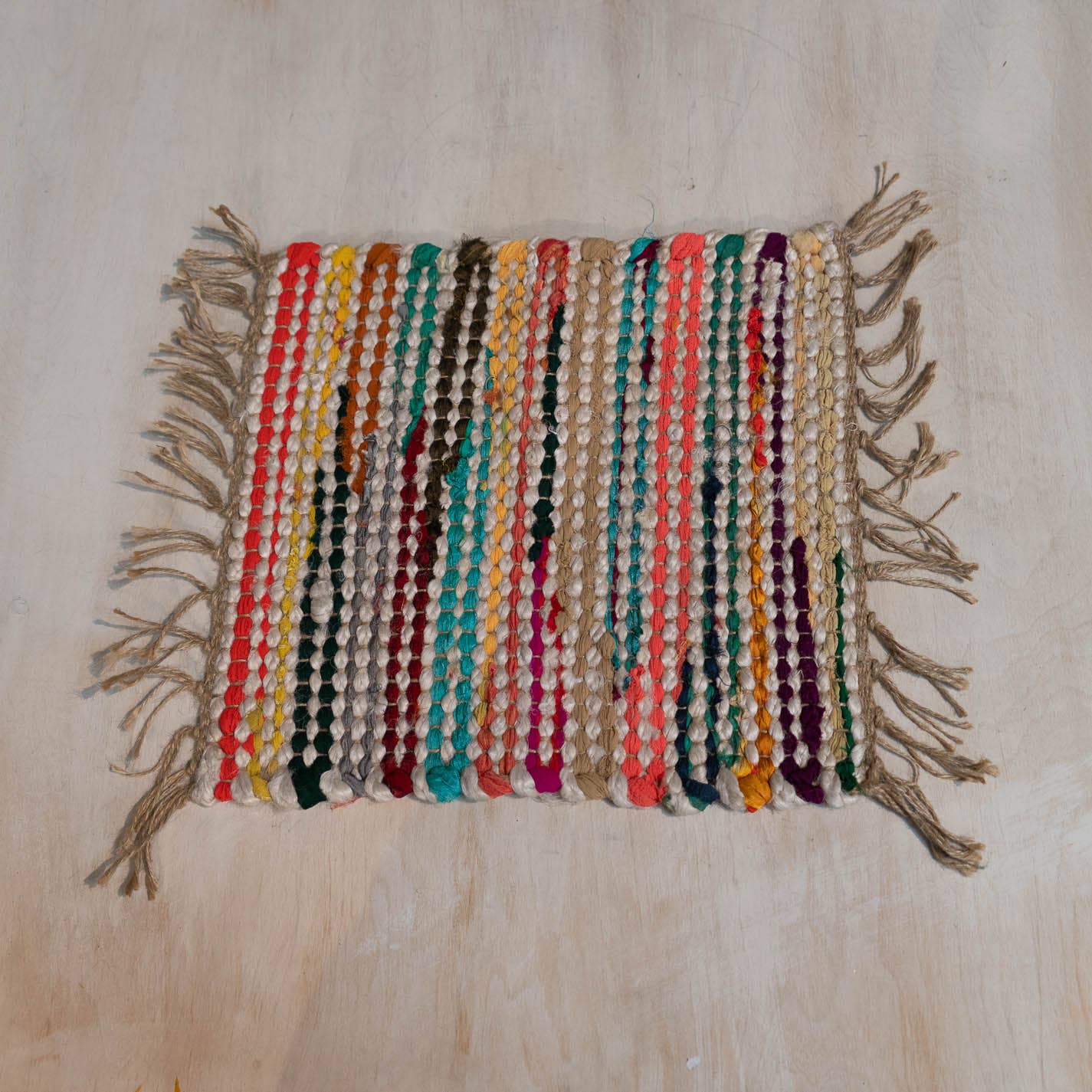 India Handicrafts Inc - Woven Natural & Multi-Colored Jute Square Placemat w/ Fringe