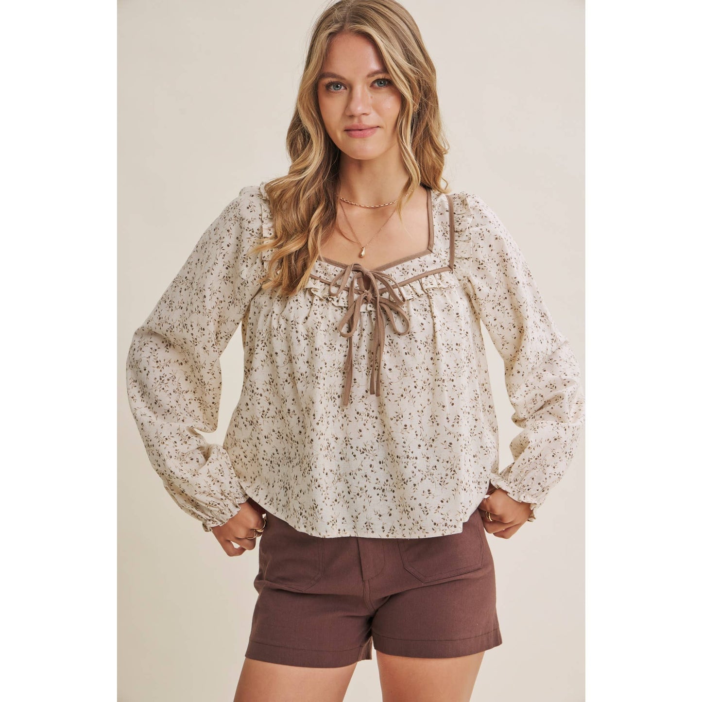 in february - PRAIRIE ROMANCE BOTANICAL BOW TIE FRONT RUFFLED BLOUSE