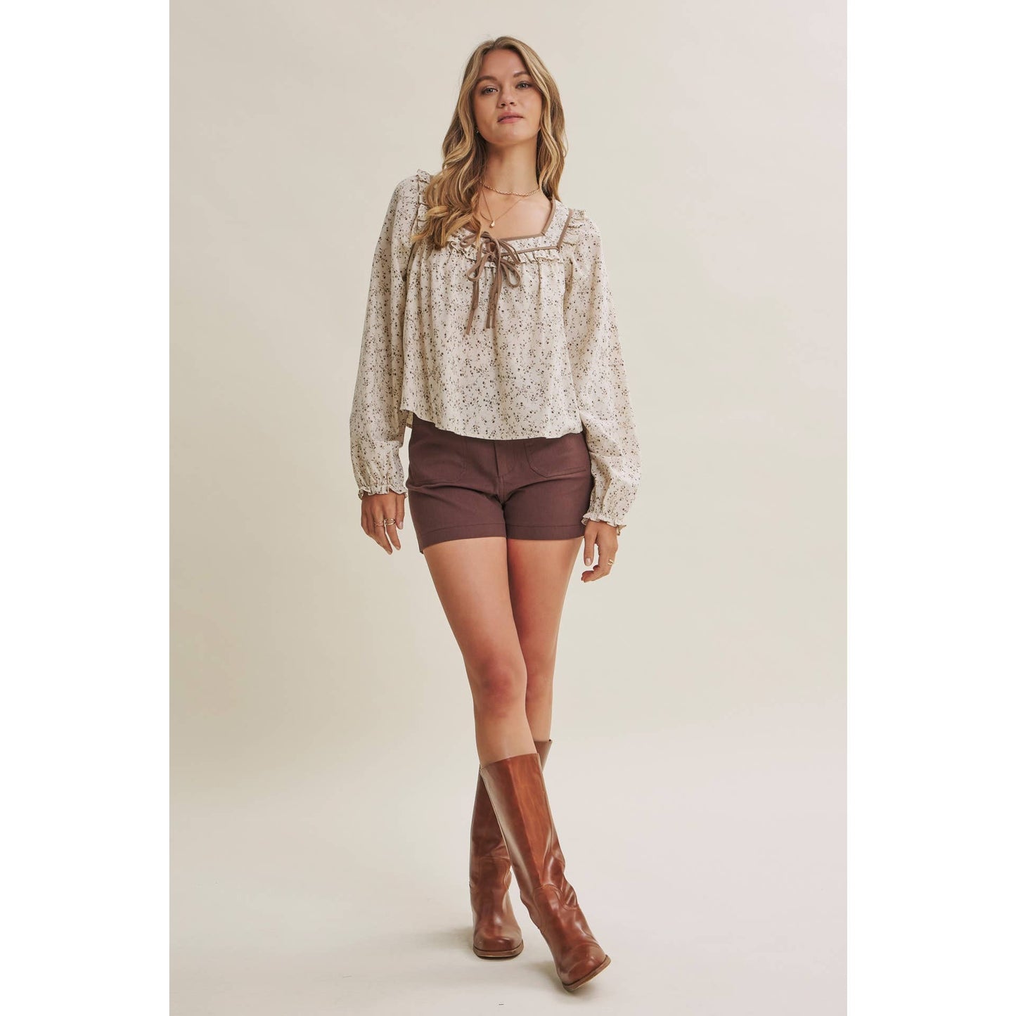 in february - PRAIRIE ROMANCE BOTANICAL BOW TIE FRONT RUFFLED BLOUSE