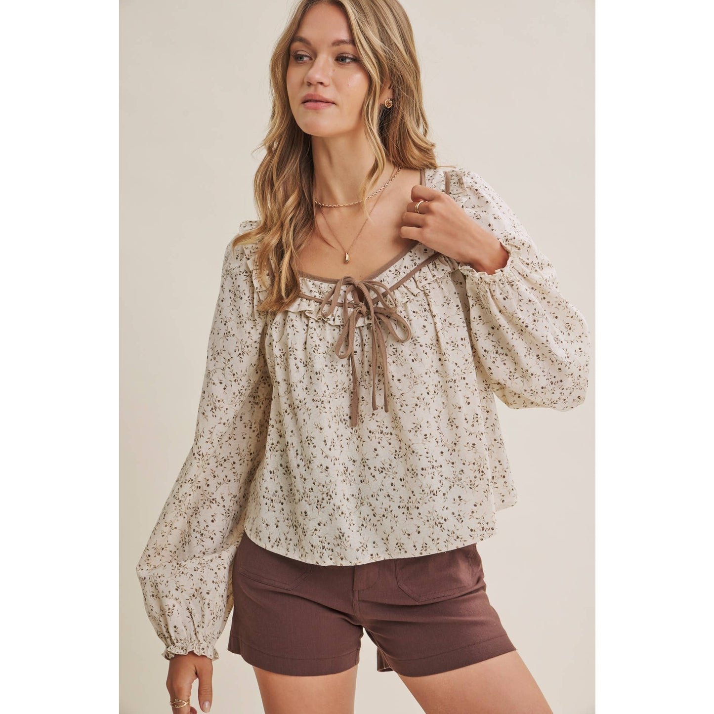 in february - PRAIRIE ROMANCE BOTANICAL BOW TIE FRONT RUFFLED BLOUSE