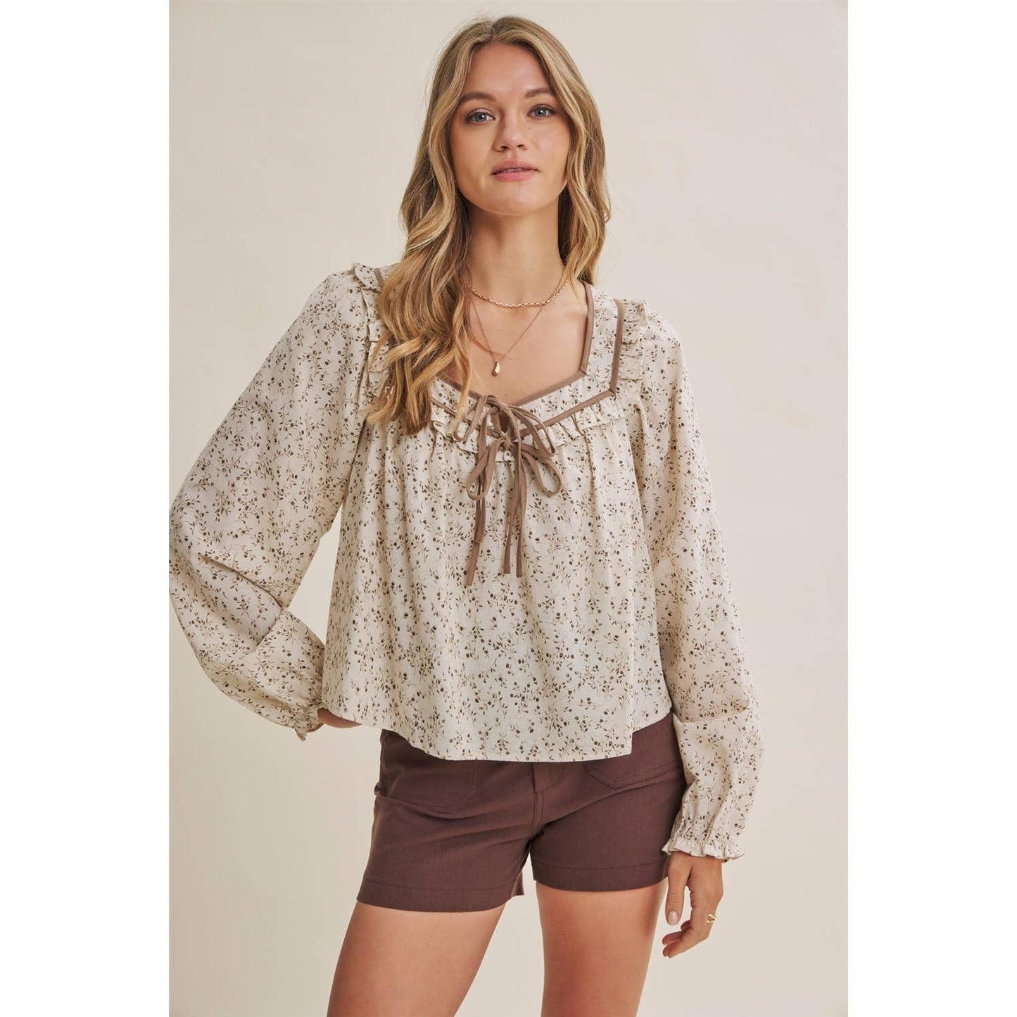 in february - PRAIRIE ROMANCE BOTANICAL BOW TIE FRONT RUFFLED BLOUSE
