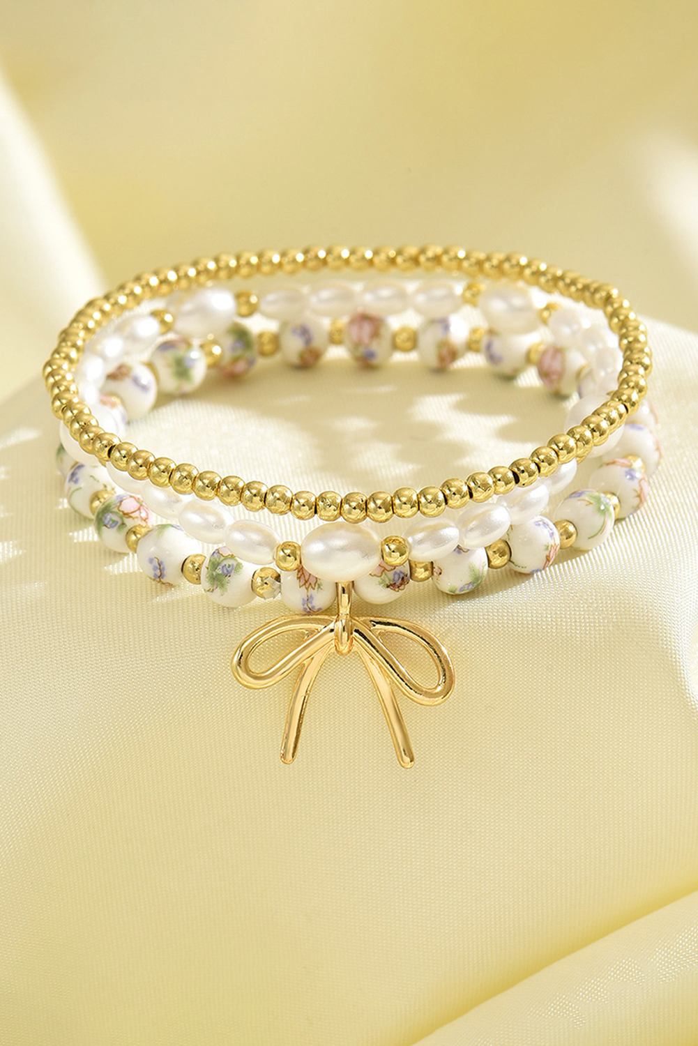 Aapparella - Bow Knot Beaded Triple Layer Bracelet Set